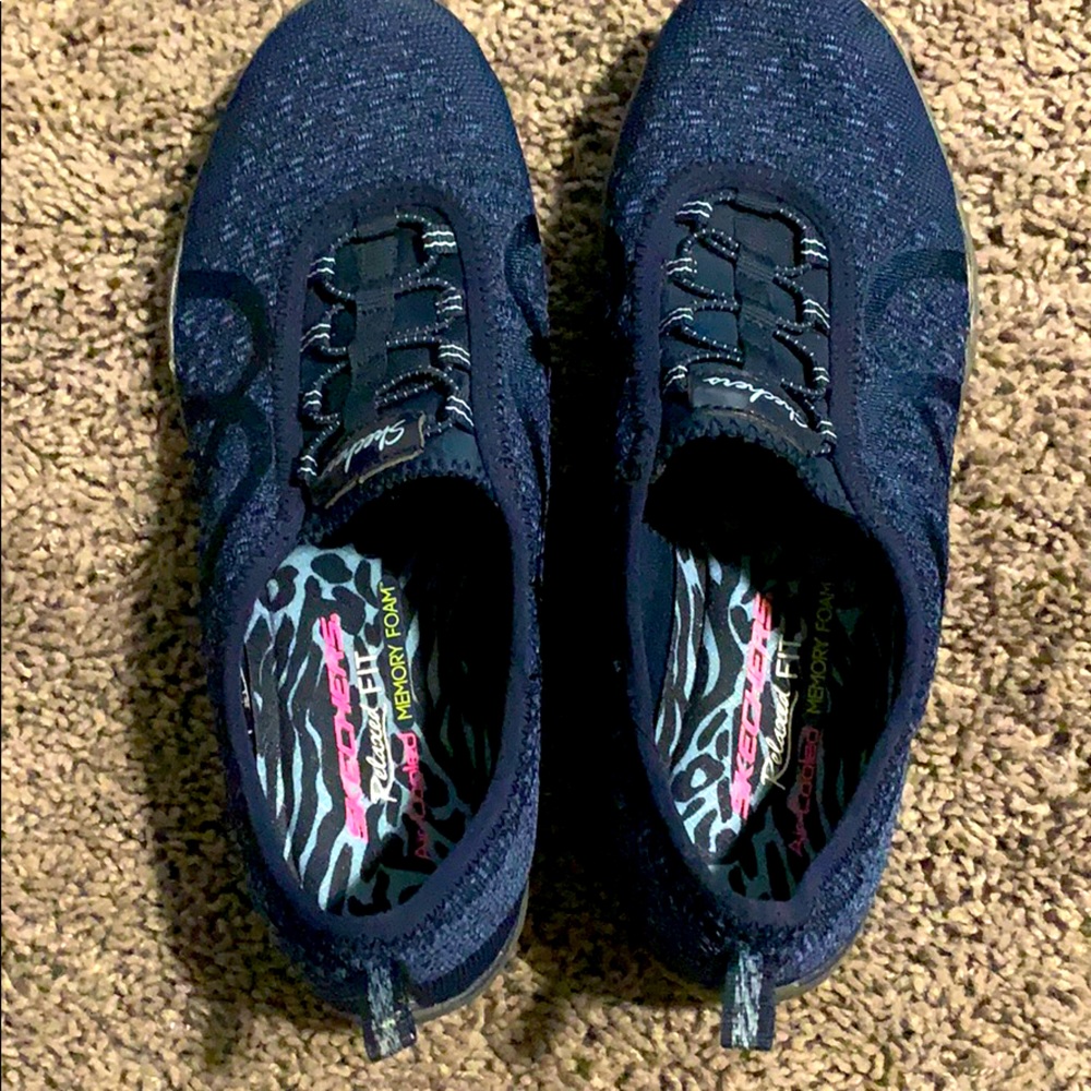 Skechers relaxed fit, “memory foam” walkers.